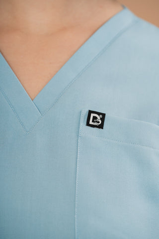 Baby Blue Scrub Top - Elite Elegance